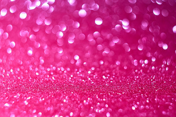 Abstract vintage background from glitter of red-purple bokeh lights, blurred background