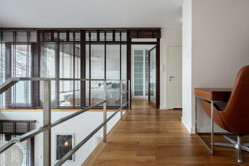 Apartment corridor with wooden floor
