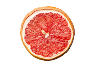 Slice of red dry grapefruit isolated on white background