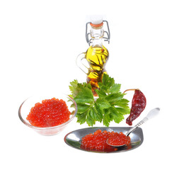 Red  caviar ,green spices, silver spoon,isolated on white background  .Selective focus .
