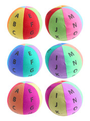 Group of colorful alphabet ball toy isolated on white background, Soft fabric ball for kid