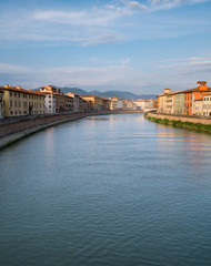 Beautiful Italian city landscape with a wide canal, ancient architecture at sunset