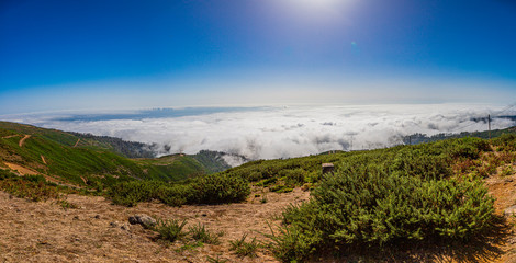 Fototapeta na wymiar Panoramic picture over the rough Portugese island of Madeira in summer