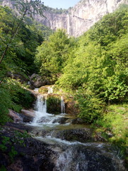 Obraz na płótnie Canvas Vrachanska Skaklya Waterfall - the highest in Bulgaria - 141 meters, and around him.