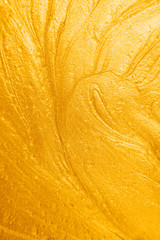 Liquid bright golden background. Abstract background image..
