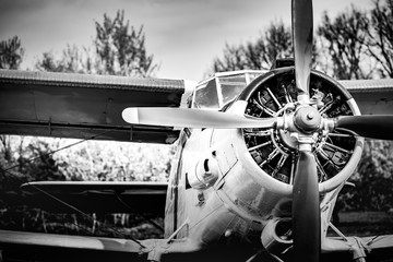 Old airplane. Vintage steel propeller plane polished up at air show