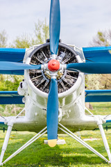 Old airplane. Vintage steel propeller plane polished up at air show