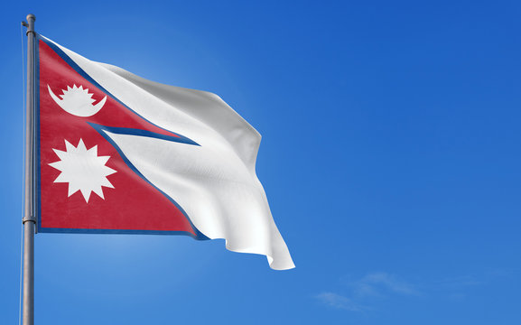 Nepal flag waving in the wind against deep blue sky. National theme, international concept. Copy space for text.