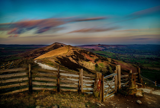  sun set casting golden light on the landscape. Taken at Mam Tor in the English Peak District.