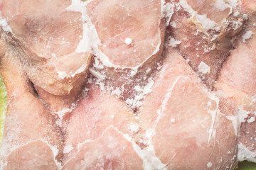 Frozen chicken legs for cooking.
