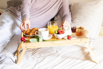 Obraz na płótnie Canvas Breakfast on the bed. Good morning concept.