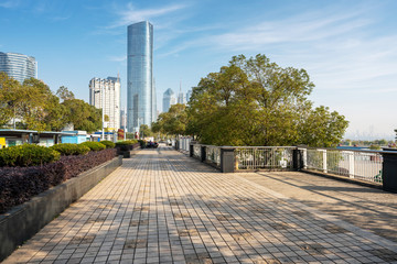 empty, modern square and skyscrapers in modern city