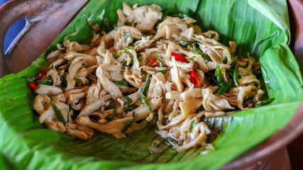 traditional indonesian culinary food. Tumis jamur or Sauteed Spicy Mushroom. Oyster mushroom (Pleurotus ostreatus) cooked with spices, very tasty and spicy