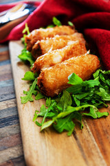 spring rolls Rice cakes stuffed with a pork stuffing accompanied by sauce