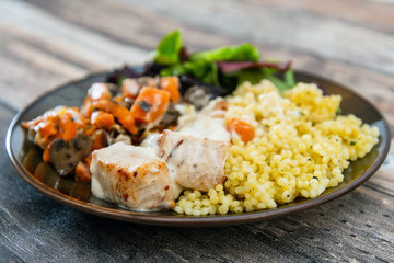 chicken peas, carrots, mushrooms and sauce