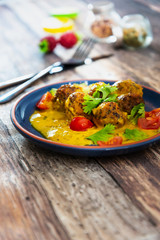 6 vegetable balls and quinoa , curry coconut cream