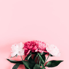 Beautiful flowers composition. Pink and white peonies flowers on pastel pink background. Valentines Day, Easter, Birthday, Mother's day. Flat lay, top view, copy space