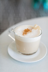 London fog latte in trendy coffee shop with modern tile floors © Deidre