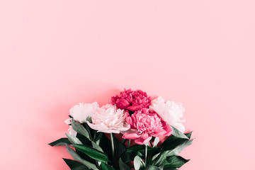 Beautiful flowers composition. Pink and white peonies flowers on pastel pink background. Valentines Day, Easter, Birthday, Mother's day. Flat lay, top view, copy space