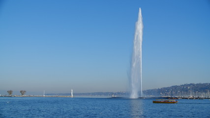 Jet d'Eau (water-jet) in full force on Lake Geneva Switzerland, taken on a clear day, perfect blue...