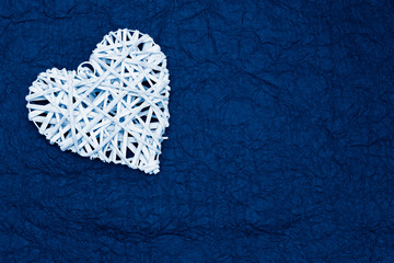 Trendy classic blue background with white heart.