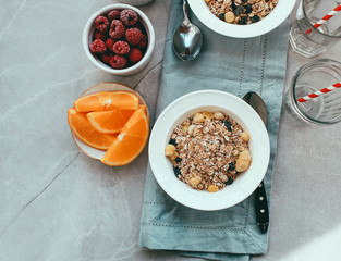 Breakfast: homemade granola with raspberries and blueberries. Homemade granola and raspberries. Top...