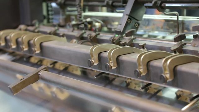 lose up of offset printing machines during production. Printing industry