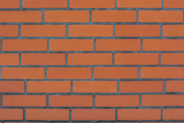 smooth wall made of new red brick light texture