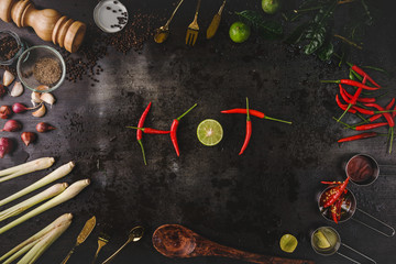 Spices for use as cooking ingredients on a wooden background with Fresh vegetables. Healthy food herbs. Organic vegetables on the table. Raw materials of cooking preparation Tom Yum.