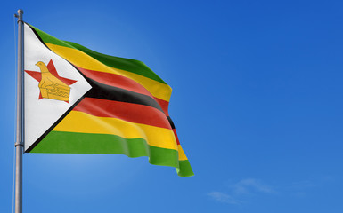 Zimbabwe flag waving in the wind against deep blue sky. National theme, international concept. Copy space for text.