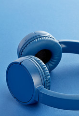 Blue wireless headphones close-up