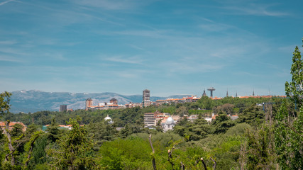 Fototapeta na wymiar Panoramic view of the downtown Madrid with Moncloa tower from the famous park Las Vistillas in Spain on a sunny day during the traditional festival in May called San Isidro in the capital of Spain