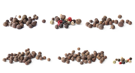 Set of different peppercorns on white background