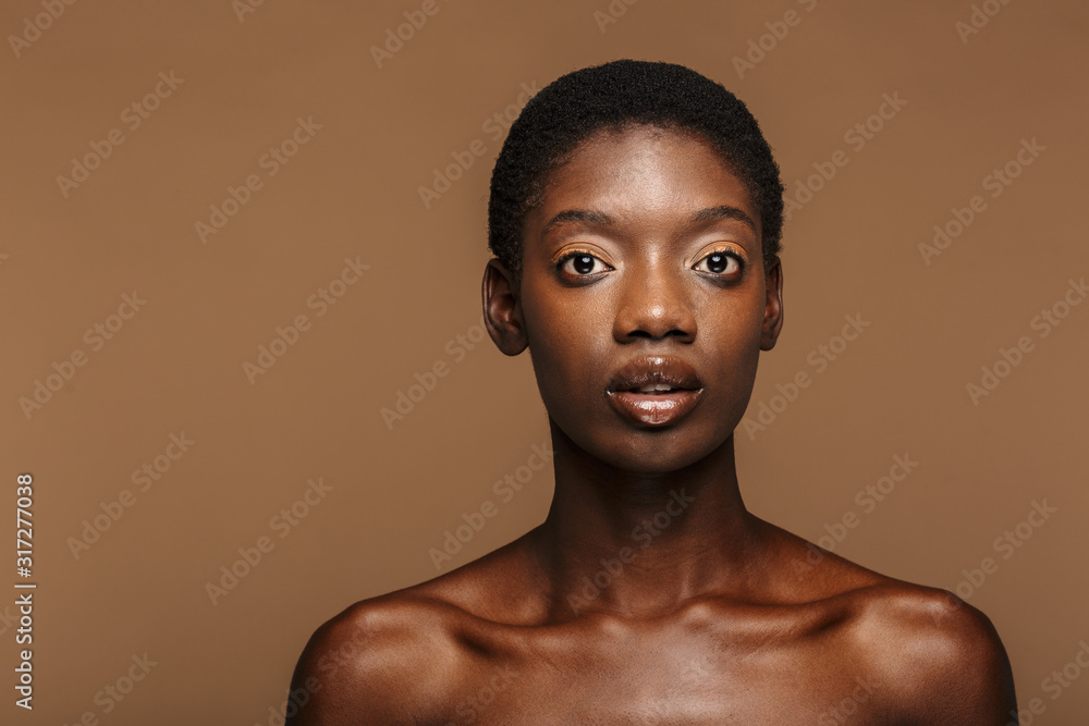 Wall mural beauty portrait of young half-naked african woman with short black hair