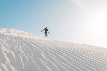 Sand dune traveller running