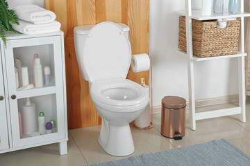 Fototapeta na wymiar Stylish toilet bowl in modern bathroom interior
