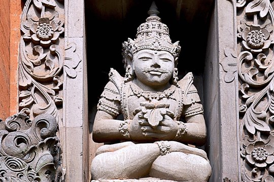 carving sculptures that have historical value displayed at the entrance of the orchid garden, Indonesia in 2020