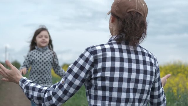 Girl run to her mother.