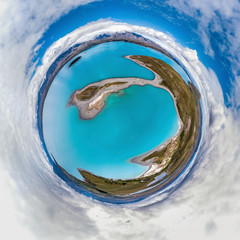 Aerial tiny planet of the blue lake and small island