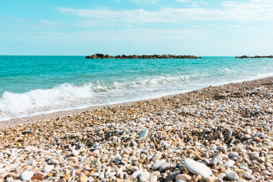 Adriatic Sea, beach with stones in Porto Recanati, Italy