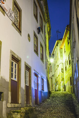 view on an ancient european narrow street at night