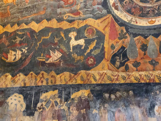 Obraz na płótnie Canvas Mtskheta, GEORGIA - December 22 2019: Detail of the damaged fresco on the wall of the historic Svetitskhoveli temple