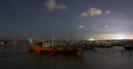 fishing boats at night