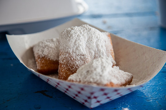 French beignets with powdered sugar on top