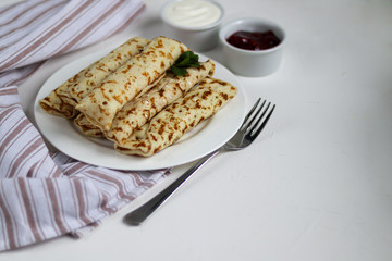 Pancakes with homemade cottage cheese. Sour-milk fermented product. Healthy, delicious breakfasts. With sour cream and raspberry jam.