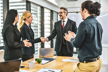 Manager shake hands with Business team success business market concept