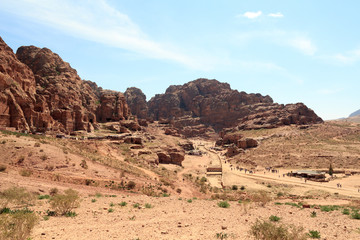 Panorama of ancient city of Petra with street of facades, amphitheatre and caves in Jordan