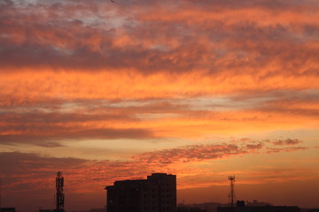 sunset over busy city