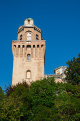 Fototapeta na wymiar tower of Astronomical Observatory of Padua, Italy. Against blue sky