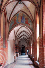 Fototapeta na wymiar Cloisters of the High Castle part of the Medieval Teutonic Order castle and monastery in Malbork, Poland